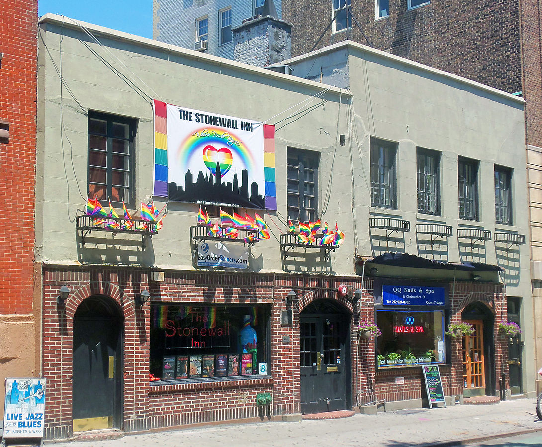Stonewall Inn 2012 with gay-pride flags and banner" by Daniel Case - Own work